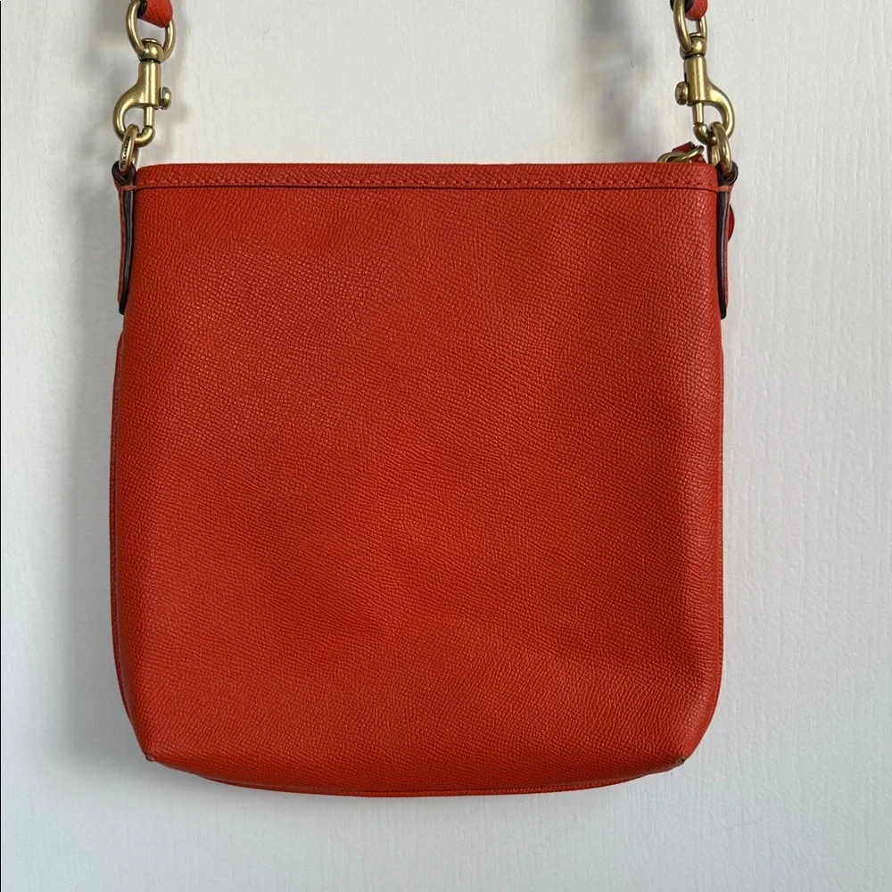 Coach Orange Pebble Leather Crossbody Bag With Front Pocket